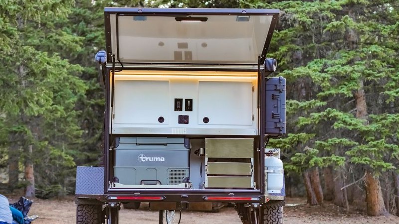Packed galley kitchen that makes a teardrop camper rental option more attractive